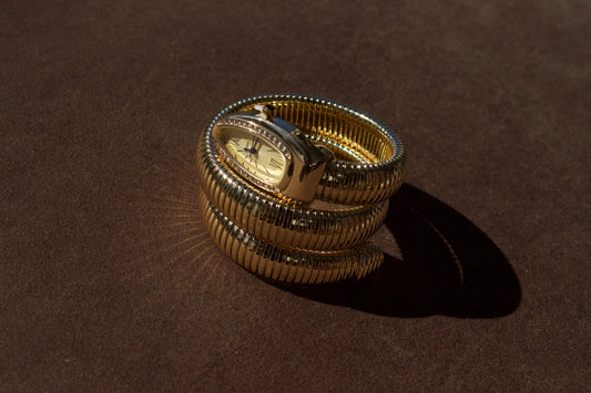 Gold snake watch
